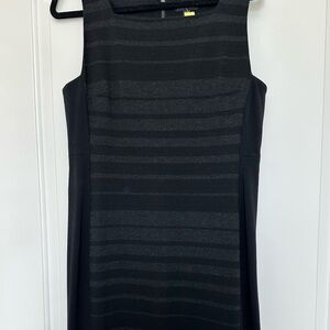 Eileen Fisher sleeveless body con sheath dress
Show off you’re curves